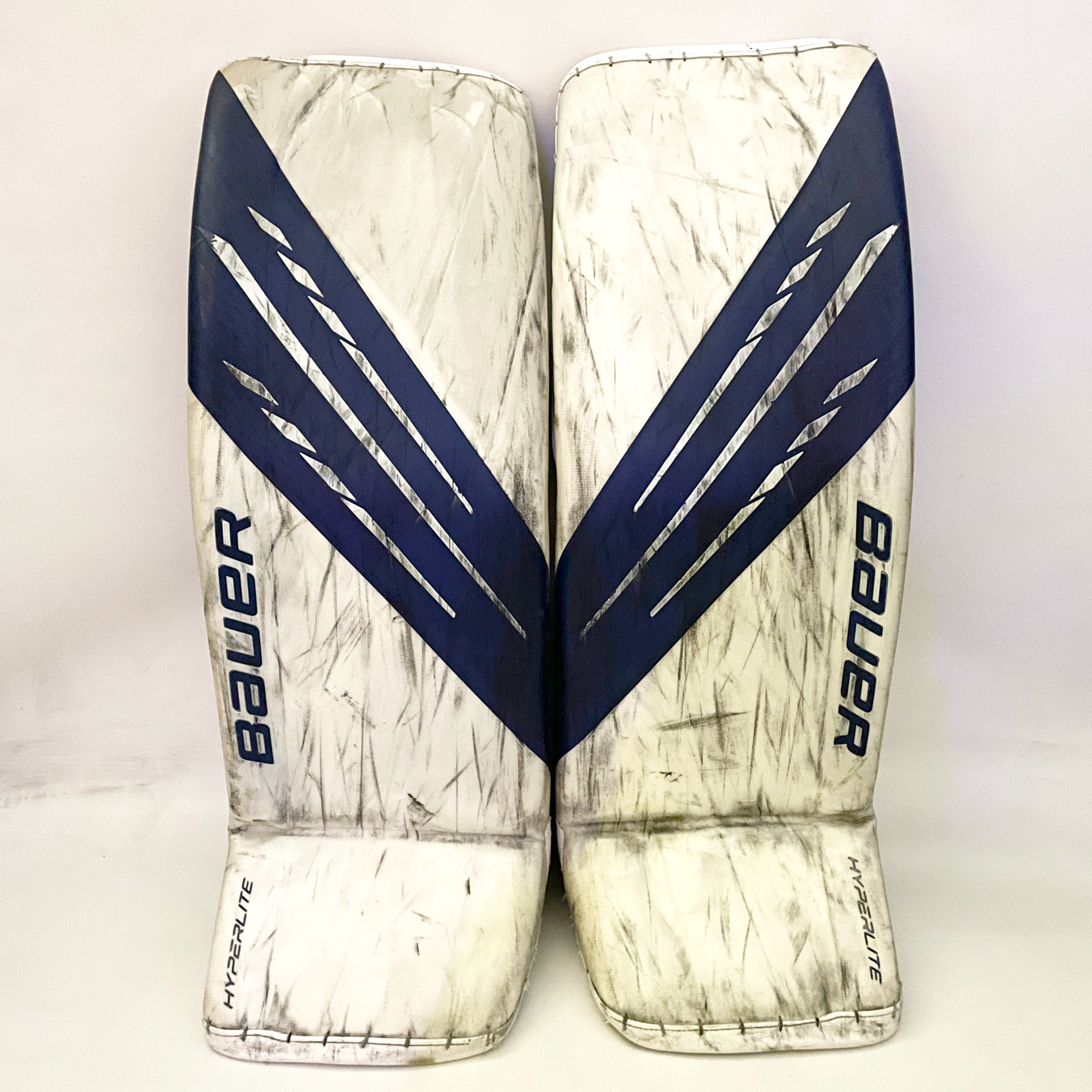 Bauer Vapor Hyperlite - Jambières de gardien Pro Stock d'occasion (blanc/bleu)
